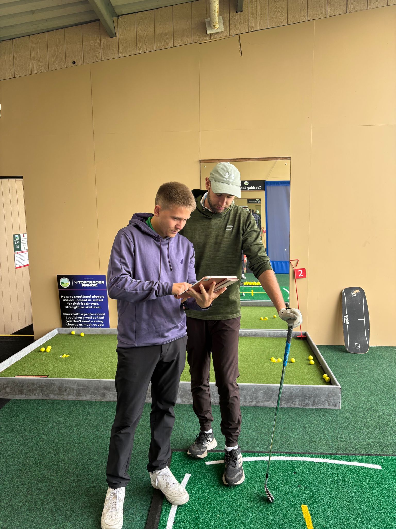 Andrew Reid coaching a golfer at Winchester Golf Academy