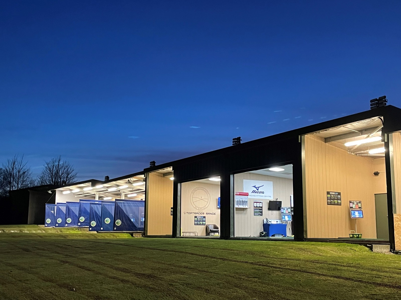 Floodlit driving range at night